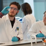 Science Outreach, O'Brien Centre for Science - students in lab coats in Chemistry laboratories