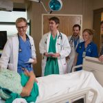 Doctors attending to a patient