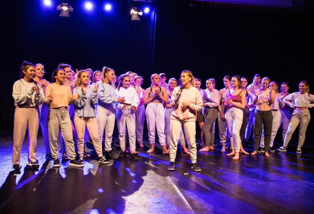 Dancers on stage performing